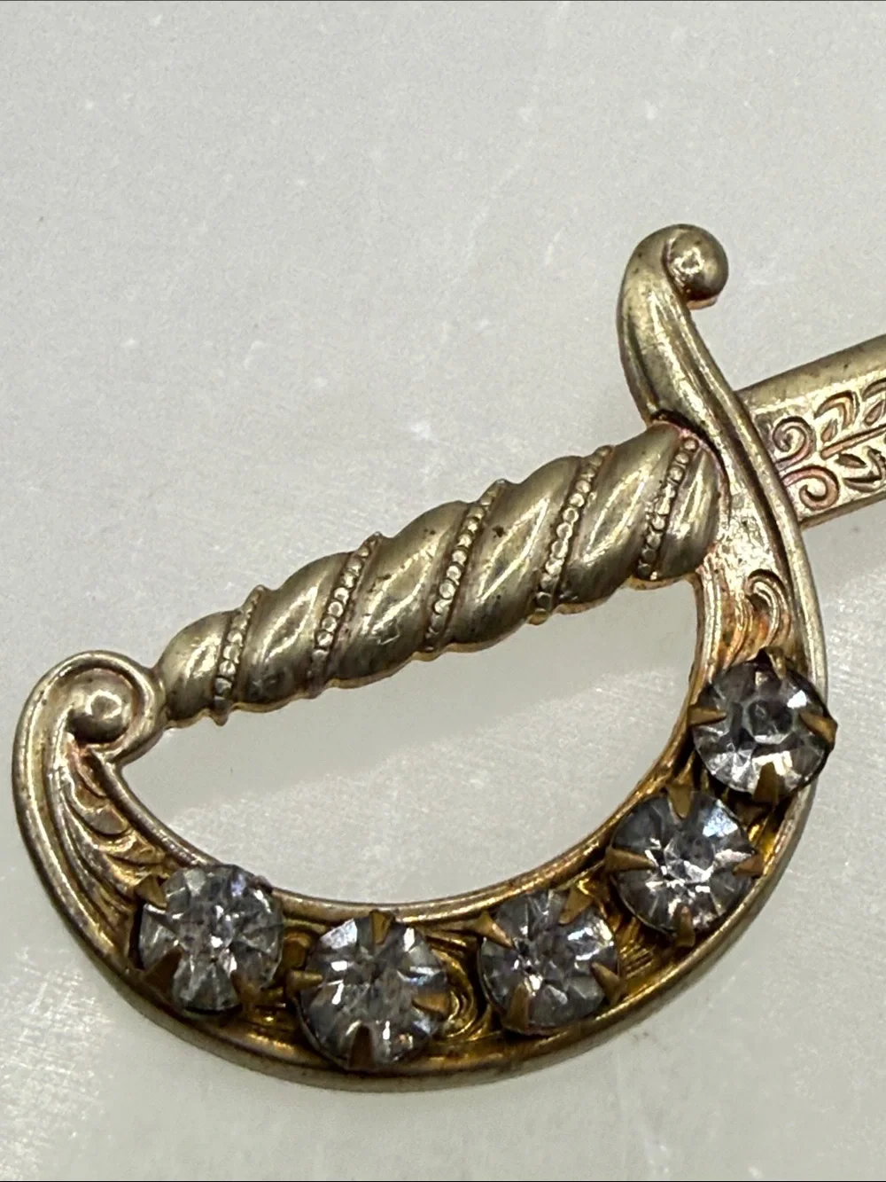 Vintage Rhinestone Sword Letter brooch pin Gold Tone ornate detail distressed